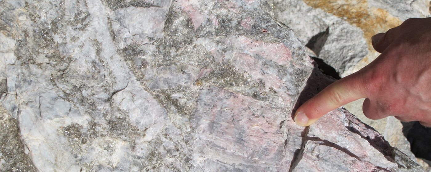 Massive petalite (LiAlSi4O10) mineralisation in the Arcadia Pegmatite, Zimbabwe. Petalite is primarily used in the manufacture of glass and ceramics.