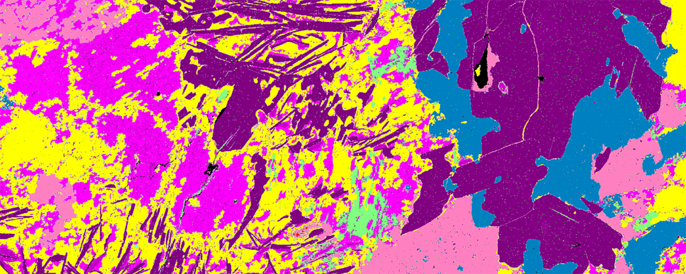 SEM (scanning electron microscope) mineral phase map showing the distribution on mineral phases in a sample of altered lithium-tantalum-tin pegmatite from Kamativi, Zimbabwe. Scale bar = 100 microns.